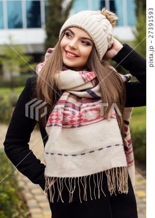 Pretty teen girl is wearing warm winter clothes Pretty teen girl is wearing warm winter clothes 27391593