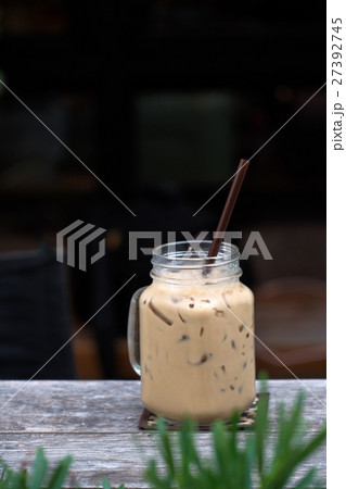 Ice coffee glasses on wood table Ice coffee glasses on wood table 27392745