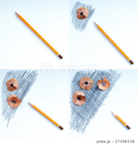 Pencil sharpener shavings on the white paper. Back 27396538