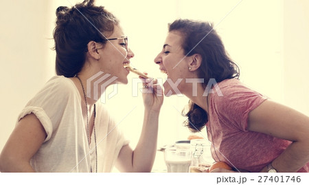 Lesbian Couple Together Indoors Concept Lesbian Couple Together Indoors Concept 27401746