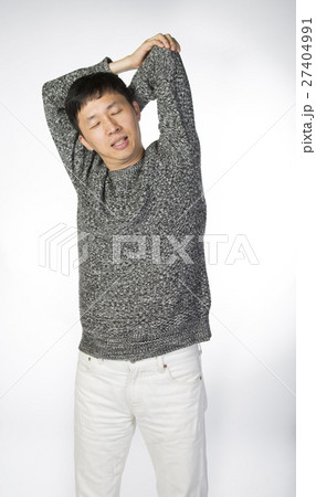 man stretching his arm 27404991
