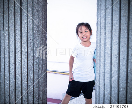 Adorable little girl playing peekaboo 27405703