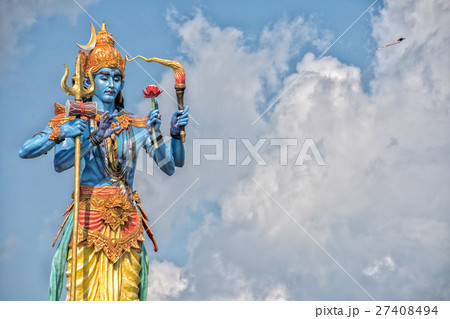 shiva statue in the blue light sky background shiva statue in the blue light sky background 27408494