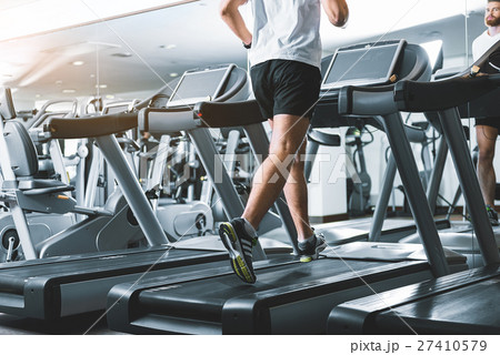 Sportsman using jogging track for heath 27410579