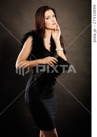 woman evening dress handbag in hand on black woman evening dress handbag in hand on black 27410699