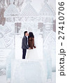 Winter wedding couple kissing in the middle of the 27410706