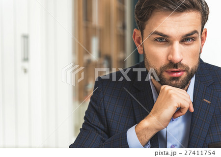 Confident businessman planning his work 27411754