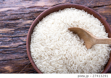 rice on a wooden background rice on a wooden background 27413291