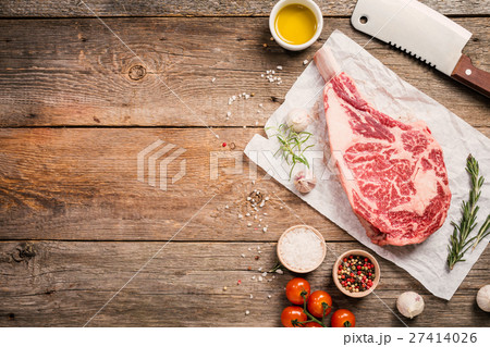 Raw tomahawk beef steak 27414026