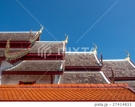Main church delicate Thai art on roof Main church delicate Thai art on roof 27414833