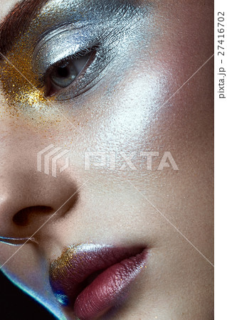 Beautiful girl with creative golden and silver Beautiful girl with creative golden and silver 27416702