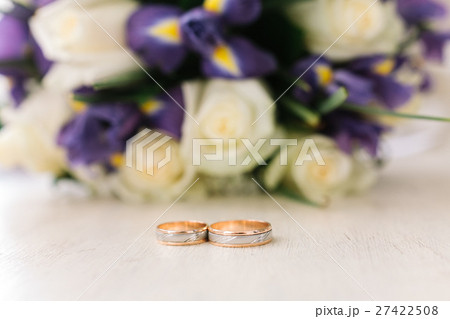 gold rings against the background of a wedding gold rings against the background of a wedding 27422508
