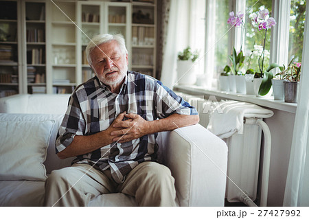 Senior man suffering from chest pain Senior man suffering from chest pain 27427992