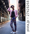 Portrait of young black woman in dark city street 27428268