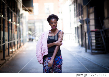 Portrait of young black woman on city street 27428275