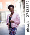Portrait of young black woman on city street 27428279