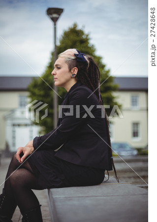 Thoughtful businesswoman relaxing 27428648