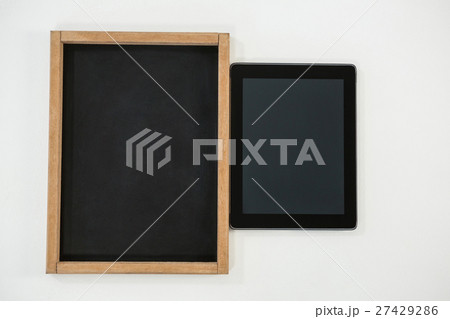 Digital tablet and slate on white background Digital tablet and slate on white background 27429286