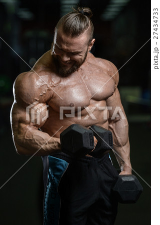 Brutal strong bodybuilder athletic men pumping up 27434733