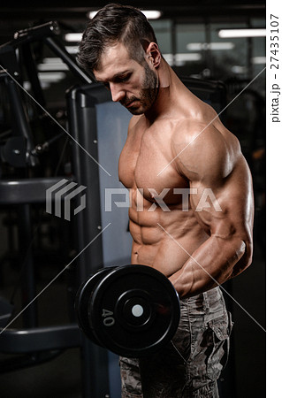 Strong and handsome athletic young man muscles abs Strong and handsome athletic young man muscles abs 27435107