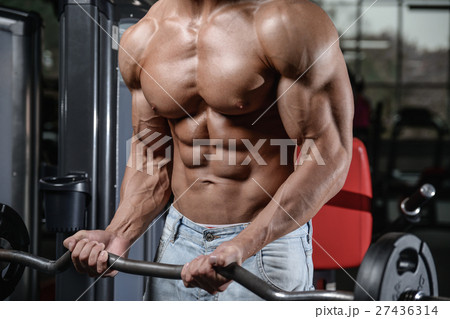 Strong and handsome athletic young man muscles abs Strong and handsome athletic young man muscles abs 27436314