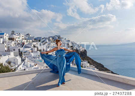 Woman in a beautiful blue dress 27437288