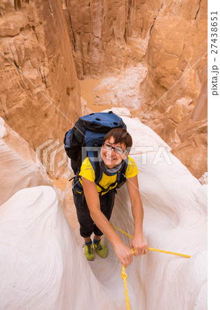 Woman climbing in canyon, Sinai, Egypt Woman climbing in canyon, Sinai, Egypt 27438651