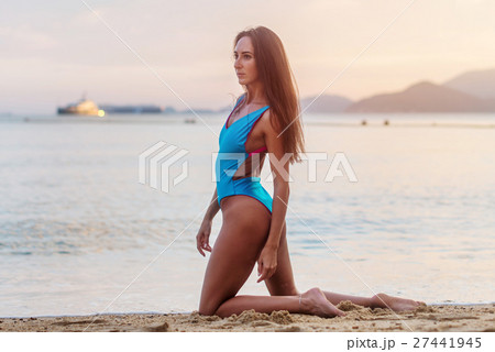 Female fashion model posing in stylish swimwear on 27441945