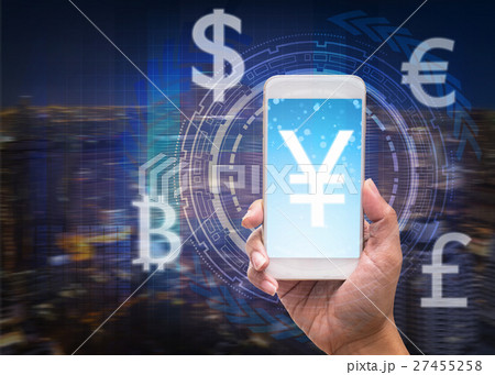 holding smart phone showing the financial technology or Fintech over the innovation technology virtual screen on cityscape background, US dollar and other currency,business Fin tech concept holding smart phone showing the financial technology or Fintech over the innovation technology virtual screen on cityscape background, US dollar and other currency,business Fin tech concept 27455258