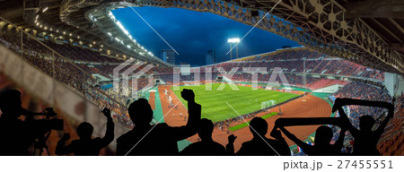 The silhouette of fan club over the panorama of Abstract blurred photo of fan sport at stadium, sport background concept The silhouette of fan club over the panorama of Abstract blurred photo of fan sport at stadium, sport background concept 27455551