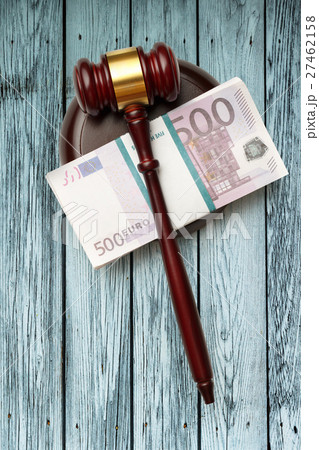 Wooden judge's gavel and money Wooden judge's gavel and money 27462158