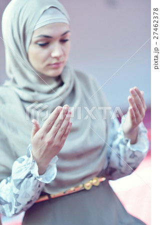 muslim woman praying in mosque muslim woman praying in mosque 27462378
