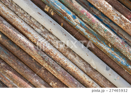 dirty and rusty old pipes stack texture background 27465932