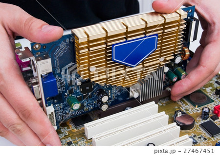Man install GPU hardware. PC motherboard upgrade 27467451