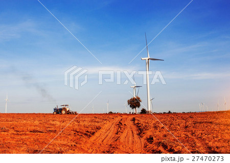 tractors are plowing tillage with the blue sky. tractors are plowing tillage with the blue sky. 27470273