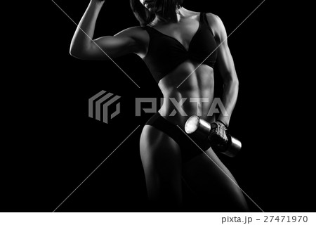 Monochrome shots of a sporty female with weights  27471970