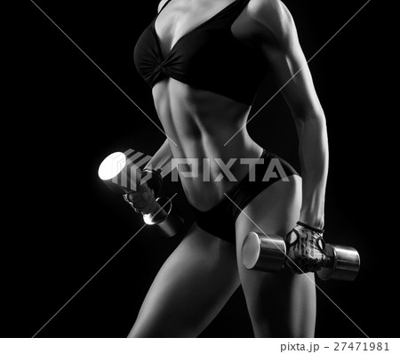 Monochrome shots of a sporty female with weights  27471981