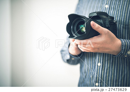 カメラと男性の写真素材