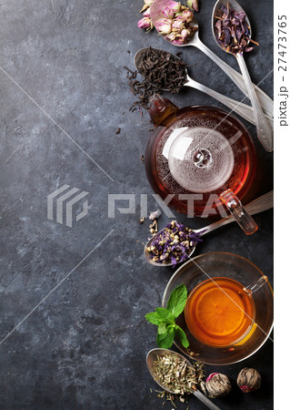 Tea cup, teapot and assortment of dry tea  27473765