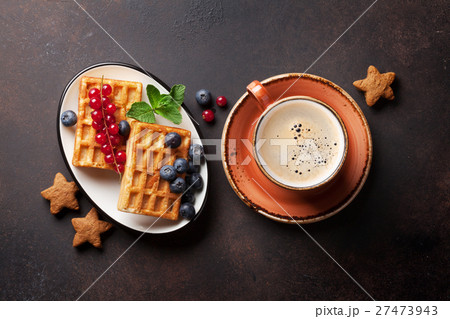 Coffee with waffles and sweets Coffee with waffles and sweets 27473943