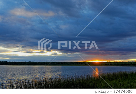 Sunset on the lake taiga 27474006