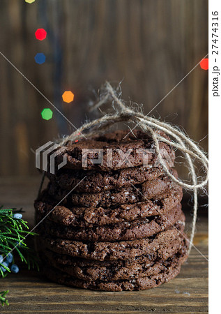 Stack of freshly baked chocolate chip cookies on 27474316