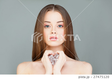 Young Healthy Woman with Ice Cubes 27475120