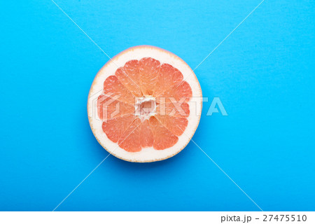 grapefruit with blue background grapefruit with blue background 27475510