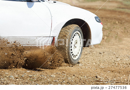 Rally car turning in track 27477536