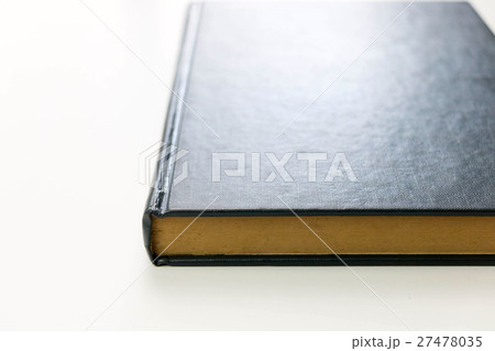 closeup blue book on white background closeup blue book on white background 27478035