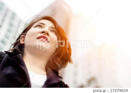 asian thai woman worker look forward on property asian thai woman worker look forward on property 27479039
