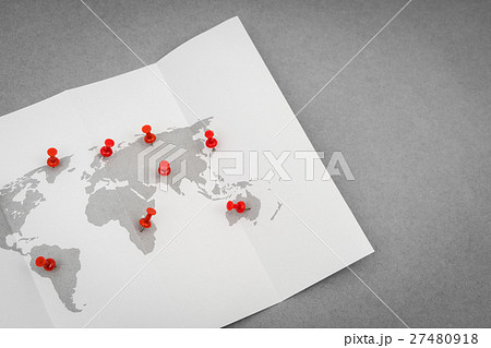 Paper folded world map with red Pin Pointer . Paper folded world map with red Pin Pointer . 27480918