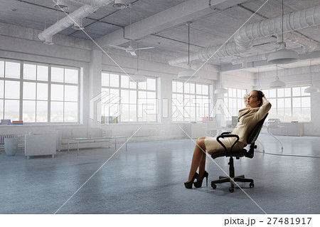 Lady boss in office chair 27481917