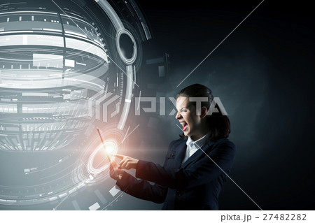 Businesswoman with tablet pc 27482282